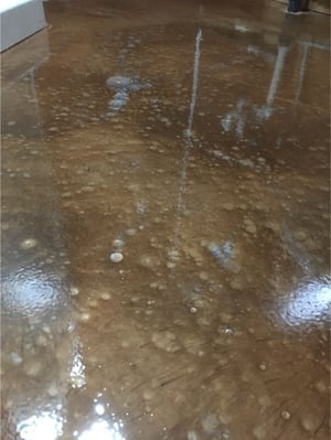 A close-up of a metallic floor in a basement in Waynesboro, PA.