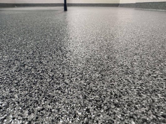 A paint chip epoxy floor in Mercersburg, Pennsylvania. Installed by Elite Floor Coatings.