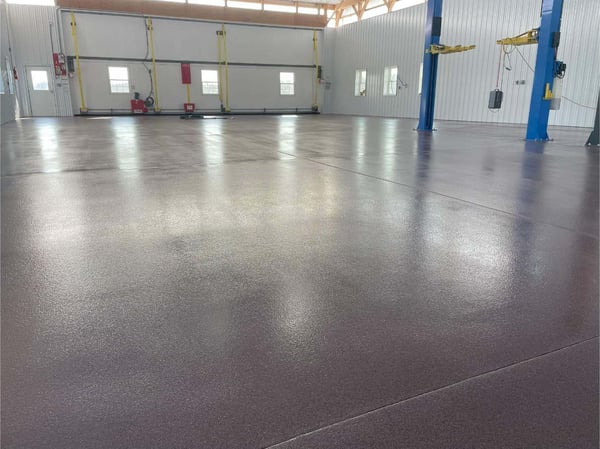 A red quartz epoxy floor installed in a large room in Emmitsburg, Maryland.