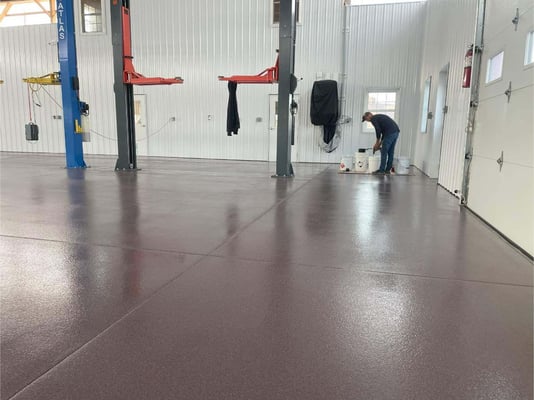 A red quartz epoxy floor installed in a large room in Emmitsburg, MD.