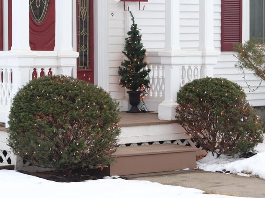 A home's front porch in the winter.