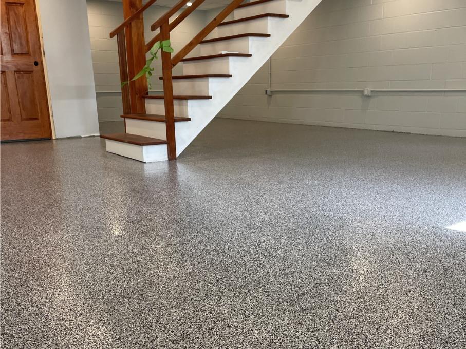 A walk-out basement with a paint chip epoxy coating. The concrete was coated with paint chip.