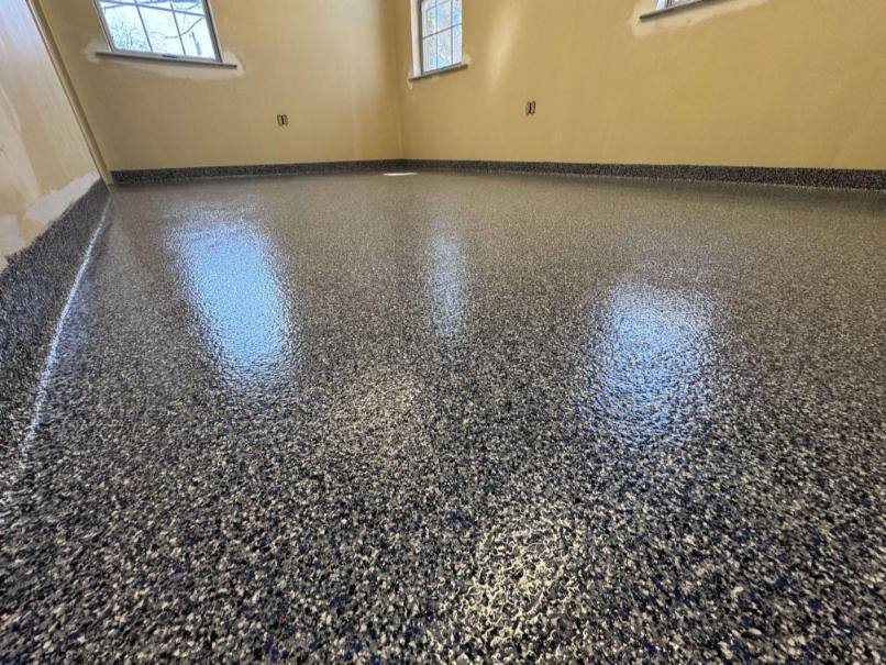 A floor in an office coated with a paint chip epoxy flooring system. Office located in Frederick, Maryland.