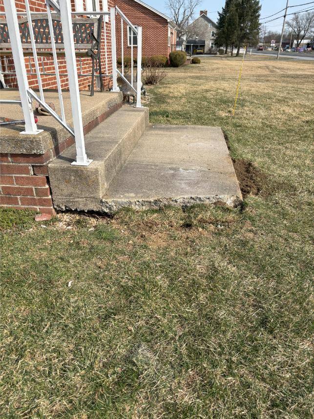 Concrete steps in Chambersburg after polyjacking repair by Elite Floor Coatings.