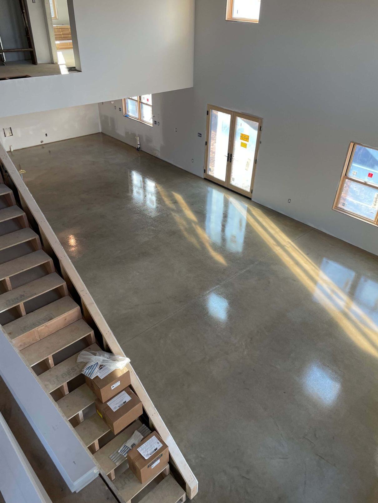 Grind & seal epoxy on a concrete floor in a Chambersburg barndominium.