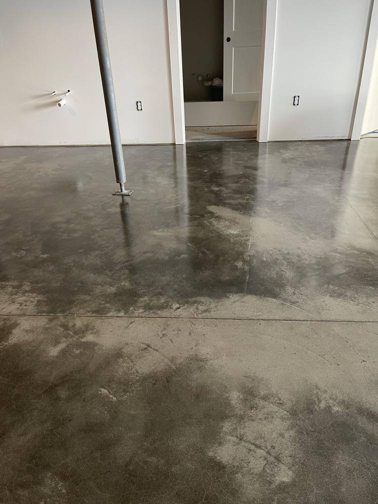 A basement floor sealed with grind and seal coating.