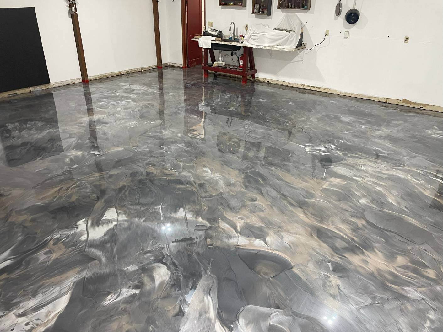 A metallic epoxy floor installed on a concrete floor in Greencastle, PA.