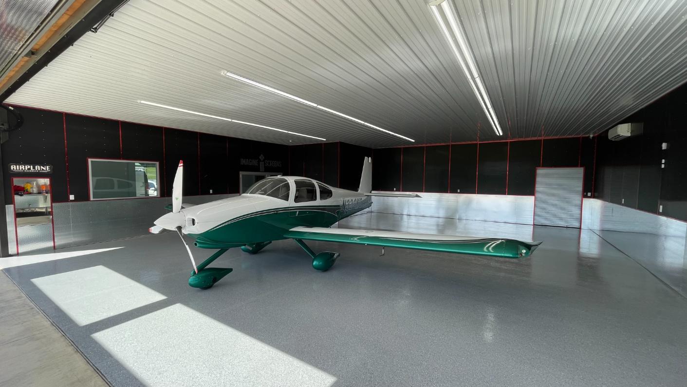 An airplane hangar in Martinsburg with a paint chip epoxy floor coating.