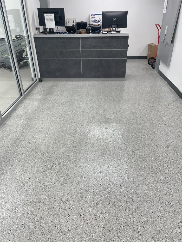 An office at a Chambersburg car dealership. The floor is coated with paint chip epoxy.