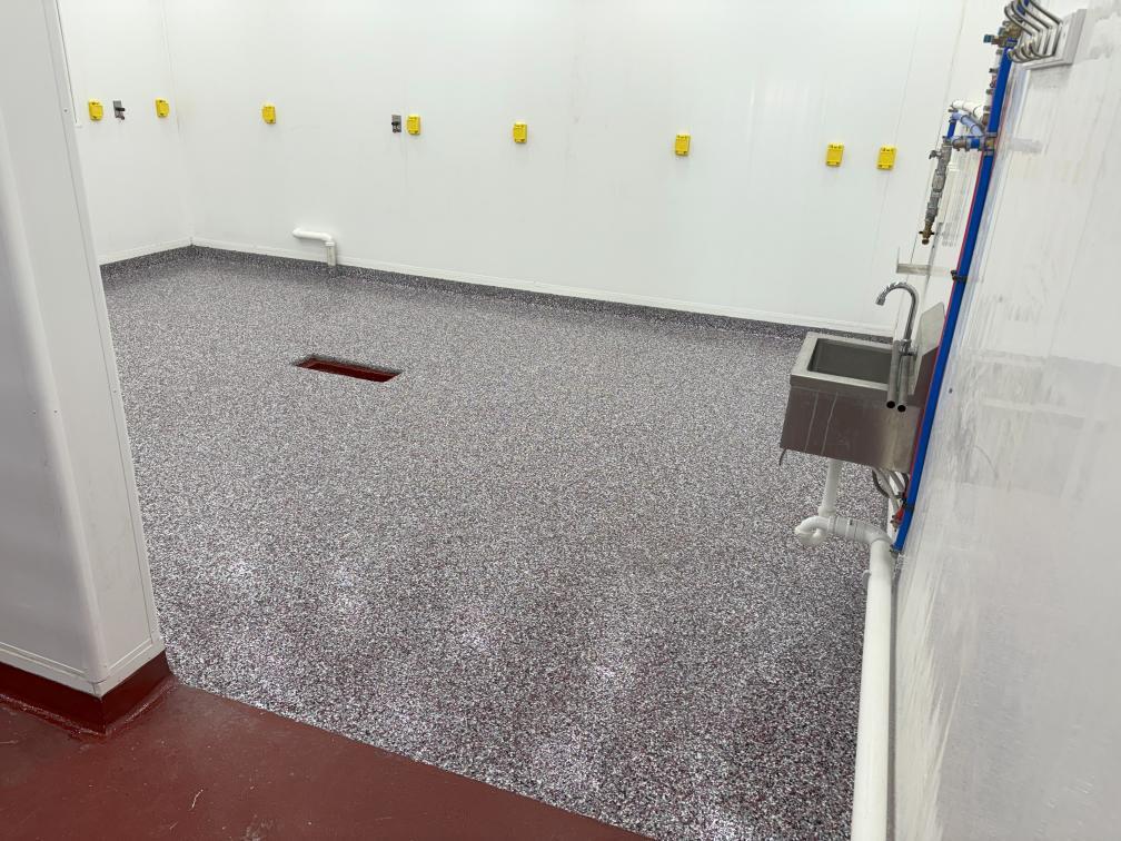 A room in a Chambersburg grocery store, with a paint chip epoxy coating applied to the floor.