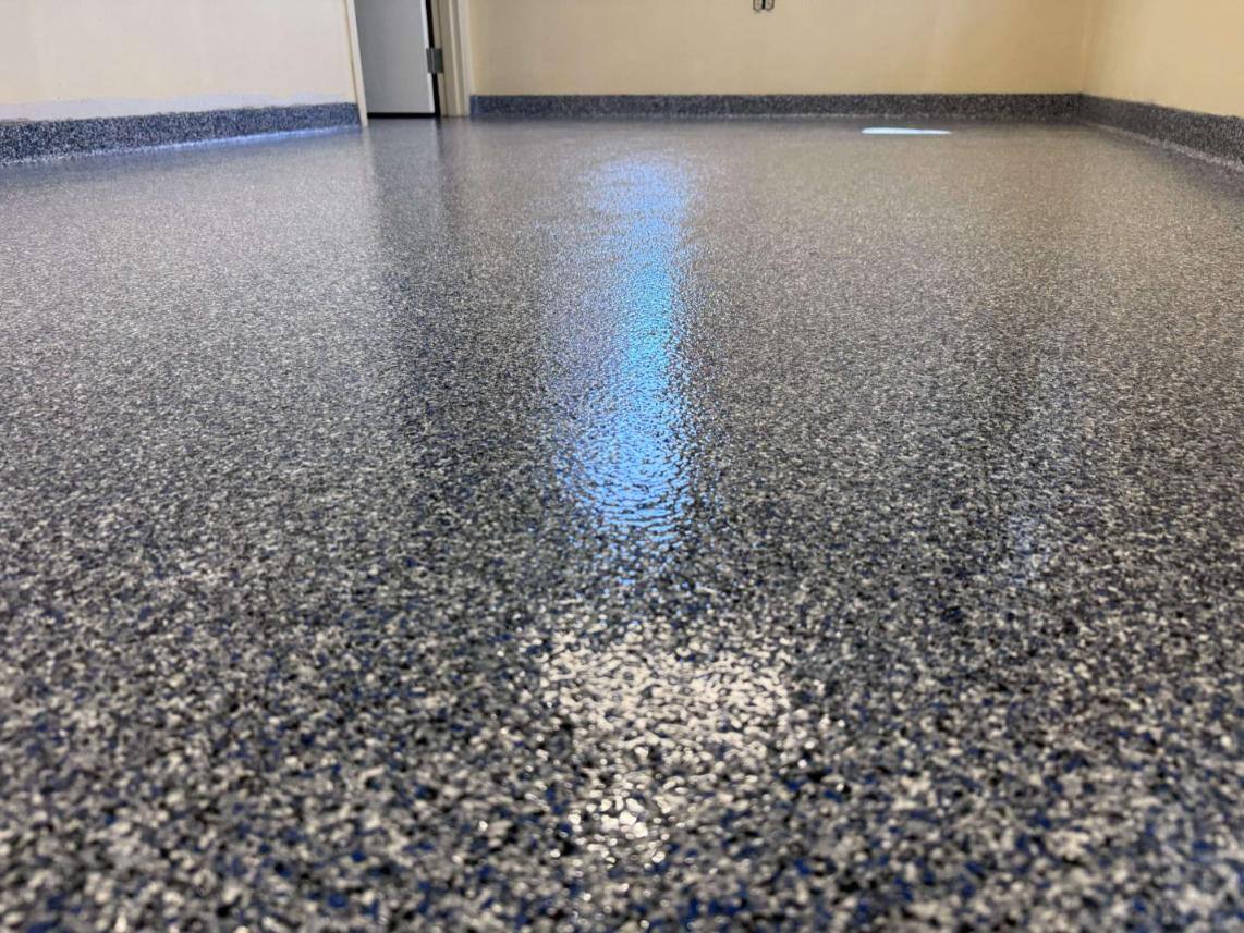 A close-up of a paint chip epoxy floor in Frederick, Maryland. This system was installed by Elite Floor Coatings.