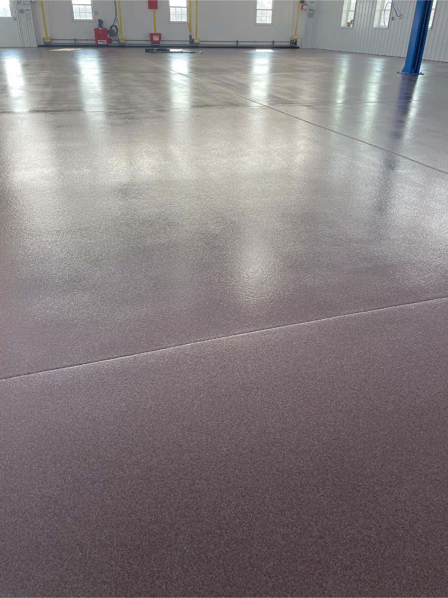 A red quartz epoxy floor installed in an expansive room in Emmitsburg, MD.