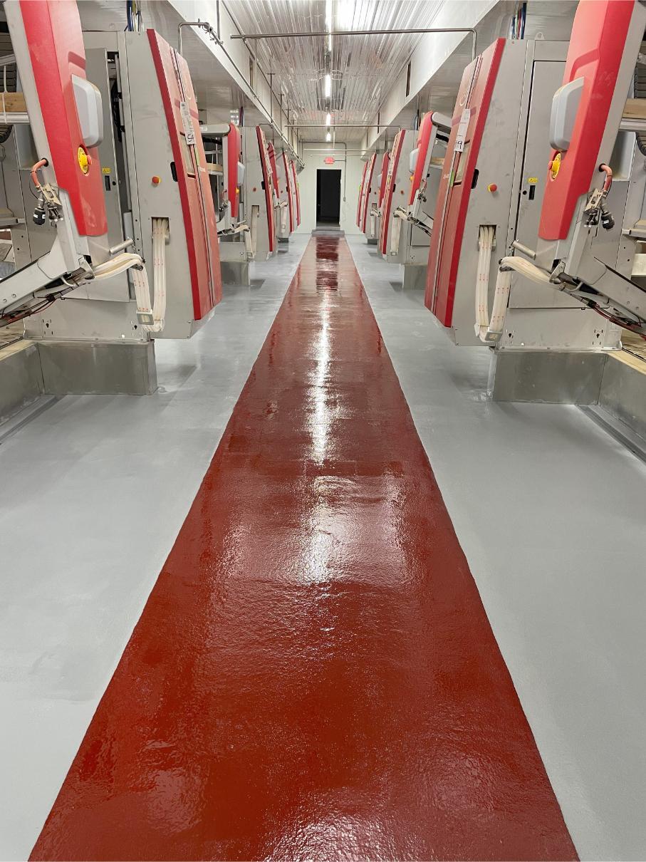 An acid-resistant coating installed on the floor of a robot farm in Rockville, Maryland.